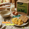 Plato de huevos revueltos de gallinas libres a pastoreo Ecoterra con tostadas y estuche de huevos